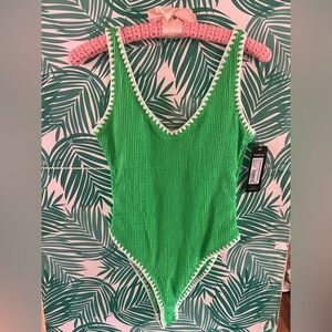 NWT Bebe neon green textured one piece swim suit white crochet detail sz M